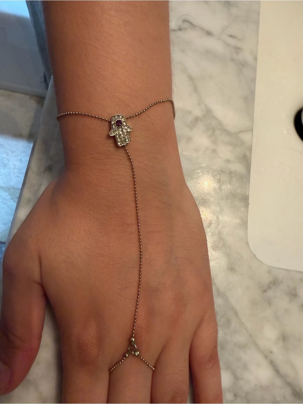 Hamsa Hand Gold Tone Handchain Bracelet with Clear Crystals and Purple Accent